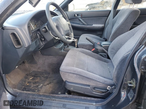 1993 Subaru Legacy L with VIN 4S3BJ6331P7949959, listed as a Copart auction lot 88360485 with 125,562 mi miles and Salvage Title. Bid and sale history available at DreamBid. Image 7.