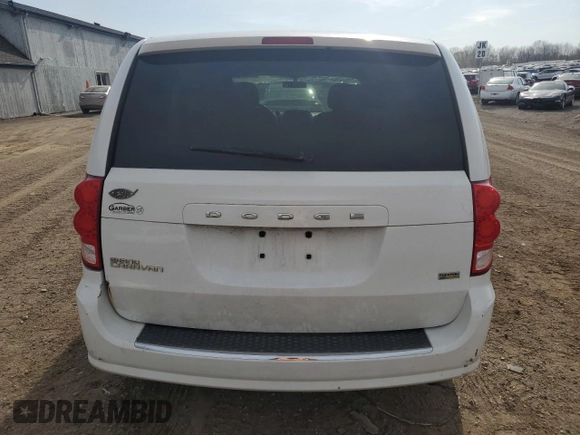2014 Dodge Grand Caravan American Value with VIN 2C4RDGBG8ER245897, listed as a Copart auction lot 54066945 with 144,177 mi miles and Clean Title. Bid and sale history available at DreamBid. Image 6.