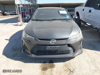 2014 Scion tC with VIN JTKJF5C74E3085237, listed as a IAAI auction lot 41788862 with 106,807 mi miles. Bid and sale history available at carsss.com. Image 13.