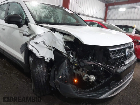 2023 Volkswagen Taos S z VIN 3VVCX7B22PM307548, wystawiony jako IAAI lot #42139747 z przebiegiem 34 299 mil mil oraz . Historia ofert i sprzedaży dostępna na DreamBid. Obrazek 6.