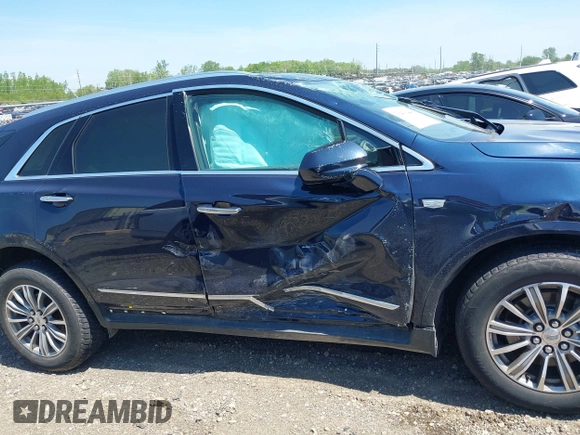 2017 Cadillac XT5 Luxury FWD with VIN 1GYKNBRS2HZ134259, listed as a IAAI auction lot 39416446 with 87,917 mi miles. Bid and sale history available at carsss.com. Image 13.