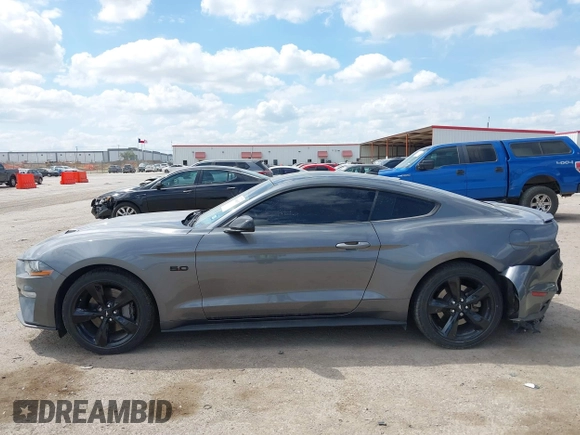 2021 Ford Mustang GT with VIN 1FA6P8CF5M5111095, listed as a IAAI auction lot 41884815 with 39,259 mi miles and . Bid and sale history available at DreamBid. Image 14.