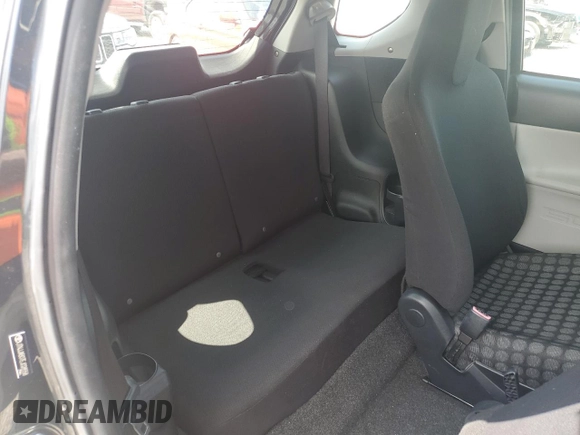 2014 Scion iQ with VIN JTNJJXB07EJ028558, listed as a Copart auction lot 64745345 with 112,221 mi miles and Clean title. Bid and sale history available at DreamBid. Image 10.