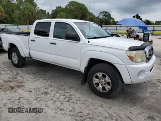 2010 Toyota Tacoma with VIN 3TMMU4FN1AM016612, listed as a Copart auction lot 59038495 with 127,448 mi miles and Clean title. Bid and sale history available at DreamBid. Image 4.