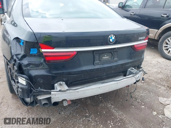 2017 BMW 7 Series 750i z VIN WBA7F0C31HGM22135, wystawiony jako IAAI lot #41919264 z przebiegiem 63 226 mil mil oraz . Historia ofert i sprzedaży dostępna na DreamBid. Obrazek 6.