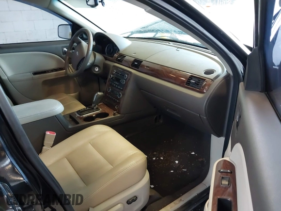 2008 Ford Taurus SEL z VIN 1FAHP24W98G169922, wystawiony jako IAAI lot #41861932 z przebiegiem 126 482 mil mil oraz . Historia ofert i sprzedaży dostępna na DreamBid. Obrazek 5.