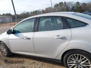 2013 Ford Focus Titanium with VIN 1FADP3J22DL167324, listed as a IAAI auction lot 41616927 with 127,259 mi miles and . Bid and sale history available at carsss.com. Image 14.