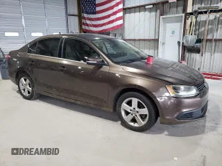 2014 Volkswagen Jetta TDI w/Premium/Nav with VIN 3VWLL7AJ3EM352687, listed as a Copart auction lot 63249725 with 122,678 mi miles and Clean title. Bid and sale history available at DreamBid. Image 4.