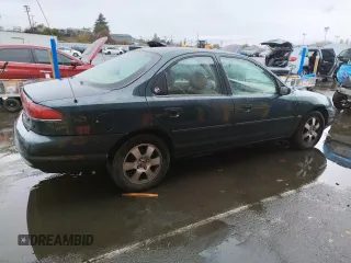 1998 Mercury Mystique z VIN 1MEFM66L5WK667211, wystawiony jako Copart lot #82342784 z przebiegiem 94 102 mil mil oraz Tytuł czysty. Historia ofert i sprzedaży dostępna na DreamBid. Obrazek 3.