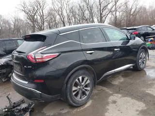 2016 Nissan Murano SL with VIN 5N1AZ2MH9GN164961, listed as a IAAI auction lot 41801749 with 144,198 mi miles. Bid and sale history available at carsss.com. Image 4.