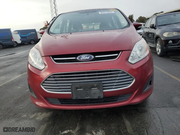 2015 Ford C-Max Hybrid SE with VIN 1FADP5AU5FL121082, listed as a Copart auction lot 83374654 with 217,002 mi miles and Clean Title. Bid and sale history available at carsss.com. Image 5.