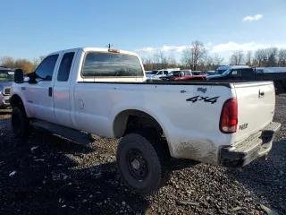 2003 Ford F-350 XL with VIN 1FTSX31P63EB62658, listed as a Copart auction lot 84054284 with 227,705 mi miles and Salvage Title. Bid and sale history available at DreamBid. Image 2.