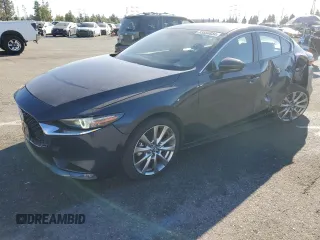 2020 Mazda 3 Premium with VIN JM1BPAEM4L1164114, listed as a Copart auction lot 83880834 with 25,590 mi miles and Salvage title. Bid and sale history available at DreamBid. Image 1.