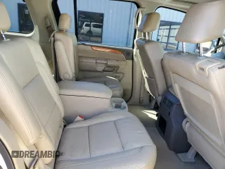 2010 Infiniti QX56 with VIN 5N3ZA0NF3AN905874, listed as a Copart auction lot 58995905 with 284,995 mi miles and Salvage title. Bid and sale history available at DreamBid. Image 11.