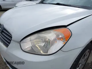 2007 Hyundai Accent GLS with VIN KMHCN46C67U097159, listed as a IAAI auction lot 41913373 with 103,303 mi miles. Bid and sale history available at carsss.com. Image 13.