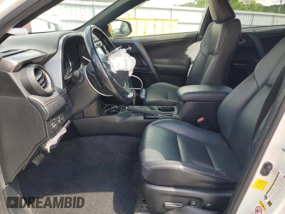 2018 Toyota RAV4 SE z VIN JTMNFREV0JJ167595, wystawiony jako Copart lot #54560605 z przebiegiem 93 056 mil mil oraz Szkoda całkowita • Salvage title. Historia ofert i sprzedaży dostępna na DreamBid. Obrazek 7.