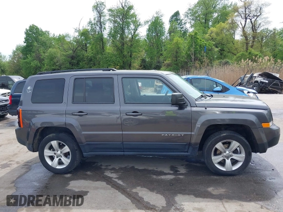 2014 Jeep Patriot Latitude with VIN 1C4NJRFB3ED847997, listed as a IAAI auction lot 42109140 with 121,299 mi miles and . Bid and sale history available at carsss.com. Image 13.