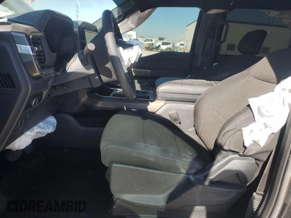 2024 Ford F-150 STX with VIN 1FTEW2LP8RFB79472, listed as a Copart auction lot 42255075 with 1,696 mi miles and Salvage Title. Bid and sale history available at carsss.com. Image 7.