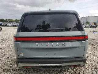 2024 Rivian R1S Adventure with VIN 7PDSGABA1RN031380, listed as a Copart auction lot 73119354 with 6,786 mi miles and Salvage Title. Bid and sale history available at carsss.com. Image 6.