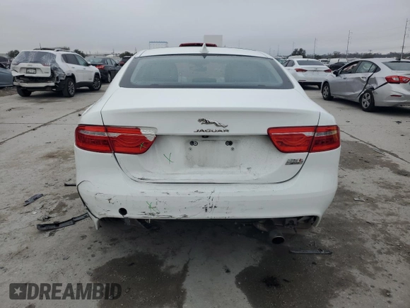 2019 Jaguar XE 25t with VIN SAJAS4FX5KCP51107, listed as a Copart auction lot 44332255 with 101,036 mi miles and Salvage Title. Bid and sale history available at carsss.com. Image 6.