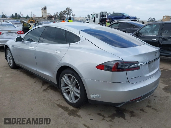 2013 Tesla Model S with VIN 5YJSA1DG7DFP11382, listed as a IAAI auction lot 42056169 with 126,975 mi miles. Bid and sale history available at carsss.com. Image 3.