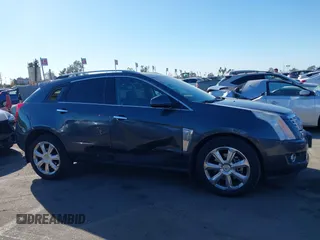 2013 Cadillac SRX Premium Collection z VIN 3GYFNEE37DS525612, wystawiony jako IAAI lot #41344221 z przebiegiem 119 573 mil mil oraz . Historia ofert i sprzedaży dostępna na DreamBid. Obrazek 14.