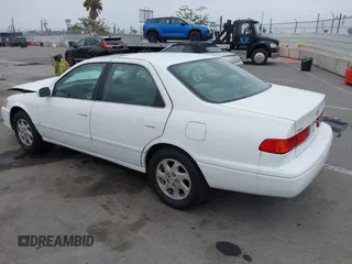 2000 Toyota Camry LE z VIN JT2BF28K3Y0289145, wystawiony jako IAAI lot #42455085 z przebiegiem 202 809 mil mil oraz . Historia ofert i sprzedaży dostępna na DreamBid. Obrazek 3.
