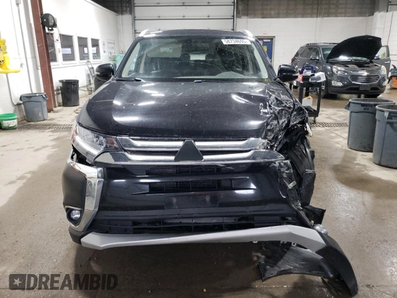 2016 Mitsubishi Outlander GT with VIN JA4JZ4AX7GZ011316, listed as a Copart auction lot 58734695 with 188,955 mi miles and Salvage title. Bid and sale history available at DreamBid. Image 5.