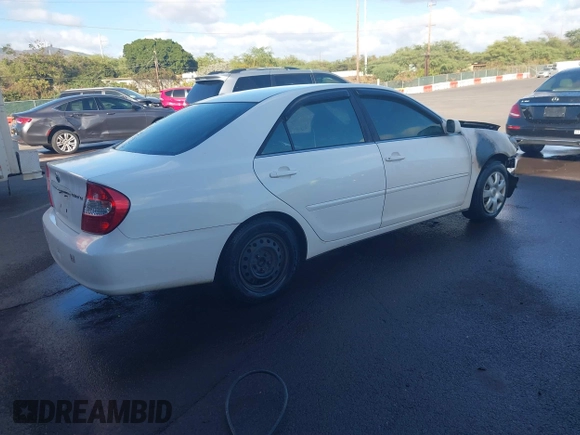 2002 Toyota Camry LE z VIN JTDBE32K120093737, wystawiony jako IAAI lot #41214245 z przebiegiem Nie podano mil oraz . Historia ofert i sprzedaży dostępna na DreamBid. Obrazek 4.