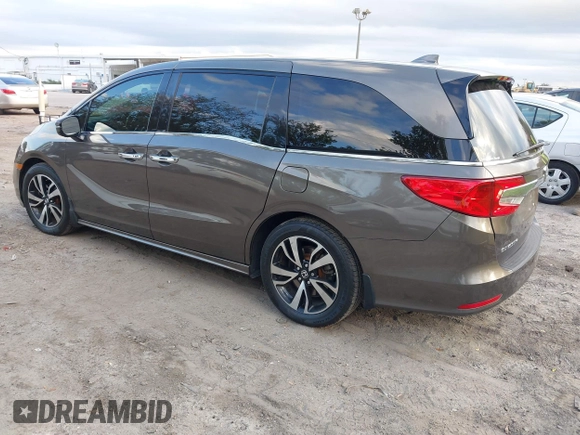 2020 Honda Odyssey Elite with VIN 5FNRL6H91LB030294, listed as a IAAI auction lot 41608291 with 74,477 mi miles and . Bid and sale history available at DreamBid. Image 3.