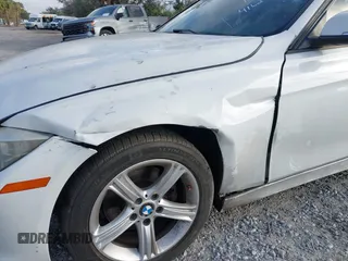 2014 BMW 3 Series 320i with VIN WBA3B1G59ENS78532, listed as a IAAI auction lot 41627172 with 133,049 mi miles. Bid and sale history available at carsss.com. Image 16.