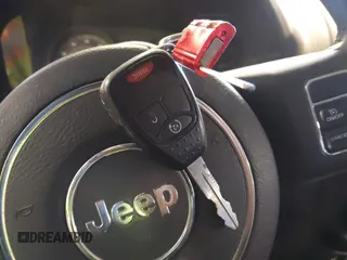 2014 Jeep Patriot Latitude with VIN 1C4NJRFB4ED864114, listed as a IAAI auction lot 41639732 with 103,119 mi miles. Bid and sale history available at carsss.com. Image 11.