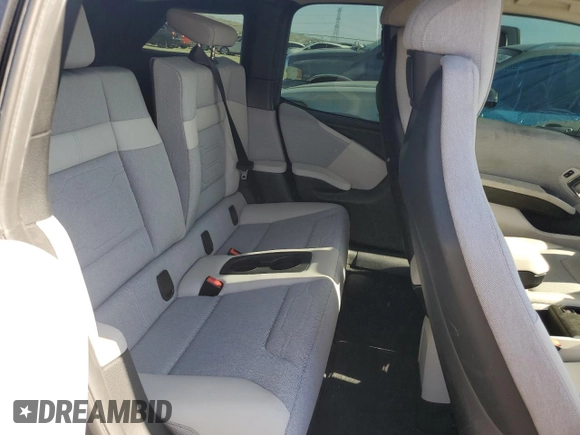 2016 BMW i3 z VIN WBY1Z2C53GV556473, wystawiony jako Copart lot #60911554 z przebiegiem 49 803 mil mil oraz Szkody całkowita. Historia ofert i sprzedaży dostępna na DreamBid. Obrazek 10.