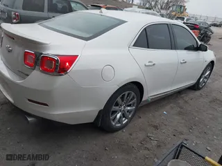 2013 Chevrolet Malibu LTZ with VIN 1G11H5SA7DF127467, listed as a IAAI auction lot 41192477 with 138,344 mi miles. Bid and sale history available at carsss.com. Image 4.