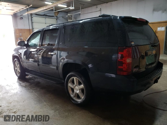 2013 Chevrolet Suburban LT with VIN 1GNSKJE75DR191647, listed as a Copart auction lot 54132905 with 127,916 mi miles and Clean title. Bid and sale history available at DreamBid. Image 2.