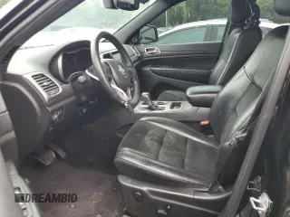 2017 Jeep Grand Cherokee Altitude with VIN 1C4RJFAG5HC892291, listed as a Copart auction lot 58579975 with 71,018 mi miles and Salvage title. Bid and sale history available at DreamBid. Image 7.