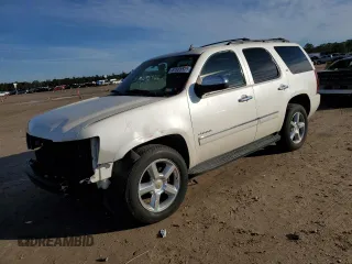 2009 Chevrolet Tahoe LTZ z VIN 1GNFC330X9R298295, wystawiony jako Copart lot #87655525 z przebiegiem 220 039 mil mil oraz Szkoda całkowita • Salvage title. Historia ofert i sprzedaży dostępna na DreamBid. Obrazek 1.