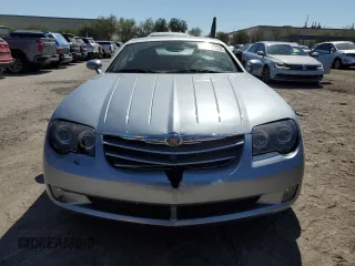 2004 Chrysler Crossfire z VIN 1C3AN69L34X004096, wystawiony jako Copart lot #73225274 z przebiegiem 48 598 mil mil oraz Szkoda całkowita • Salvage title. Historia ofert i sprzedaży dostępna na DreamBid. Obrazek 5.