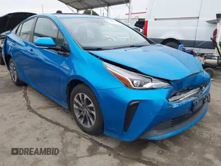 2020 Toyota Prius L Eco z VIN JTDKARFU9L3104395, wystawiony jako IAAI lot #42207156 z przebiegiem 85 572 mil mil oraz . Historia ofert i sprzedaży dostępna na DreamBid. Obrazek 1.