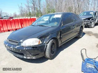 1997 Honda Civic EX with VIN 1HGEJ8245VL054080, listed as a IAAI auction lot 41880386 with 286,568 mi miles. Bid and sale history available at carsss.com. Image 2.