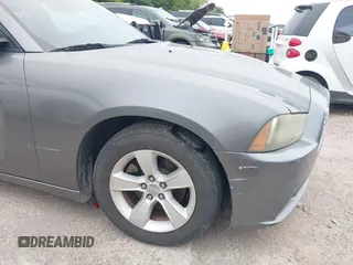 2012 Dodge Charger SE with VIN 2C3CDXBGXCH208914, listed as a IAAI auction lot 42195432 with 193,562 mi miles and . Bid and sale history available at DreamBid. Image 6.