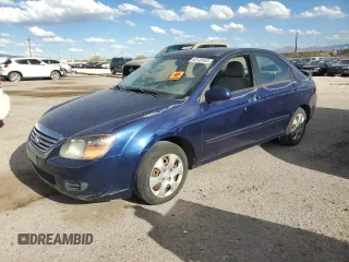 2009 Kia Spectra EX with VIN KNAFE222595590456, listed as a Copart auction lot 53132445 with 236,628 mi miles and Salvage Title. Bid and sale history available at carsss.com. Image 1.