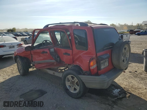 2004 Chevrolet Tracker with VIN 2CNBJ134846911647, listed as a Copart auction lot 77128924 with Not provided miles and Salvage title. Bid and sale history available at DreamBid. Image 2.