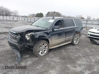 2016 GMC Yukon SLT with VIN 1GKS1BKC9GR480199, listed as a IAAI auction lot 41352032 with 146,716 mi miles. Bid and sale history available at carsss.com. Image 2.