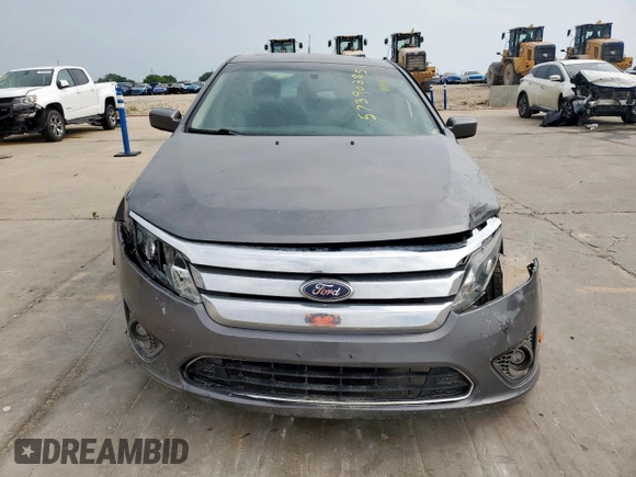 2012 Ford Fusion SE z VIN 3FAHP0HAXCR436084, wystawiony jako Copart lot #57390385 z przebiegiem 88 645 mil mil oraz Szkoda całkowita • Salvage title. Historia ofert i sprzedaży dostępna na DreamBid. Obrazek 5.