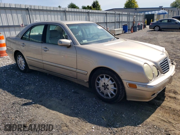 2000 Mercedes-Benz E-Class with VIN WDBJF65J2YB165568, listed as a Copart auction lot 70003994 with 146,518 mi miles and Salvage Title. Bid and sale history available at carsss.com. Image 4.