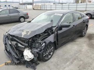 2019 Honda Civic EX z VIN JHMFC1F32KX012345, wystawiony jako Copart lot #56057475 z przebiegiem 74 096 mil mil oraz Szkoda całkowita • Salvage title. Historia ofert i sprzedaży dostępna na DreamBid. Obrazek 1.