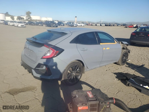 2021 Honda Civic Hatchback Sport with VIN SHHFK7H40MU401106, listed as a Copart auction lot 46873745 with 123,972 mi miles and Salvage Title. Bid and sale history available at carsss.com. Image 3.