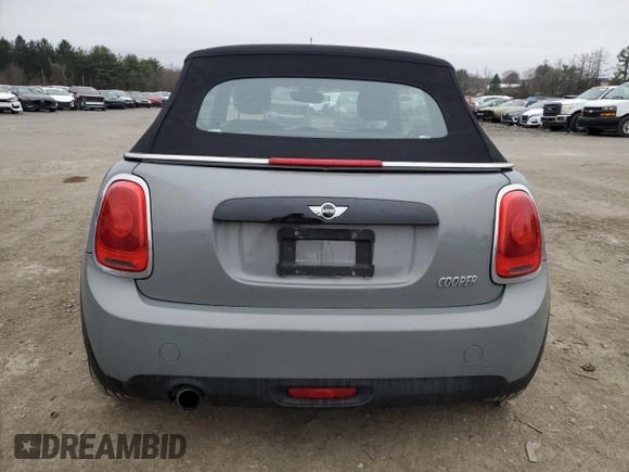 2017 MINI Convertible Cooper z VIN WMWWG5C32H3C99588, wystawiony jako Copart lot #49581565 z przebiegiem 137 798 mil mil oraz Szkoda całkowita • Salvage title. Historia ofert i sprzedaży dostępna na DreamBid. Obrazek 6.