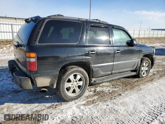 2001 GMC Yukon Denali с VIN 1GKEK63U01J253479, выставлен на аукционе Copart как лот 83272054 с пробегом 217 364 миль миль и Чистый • Clean title. История ставок и продаж доступна на DreamBid. Изображение 3.